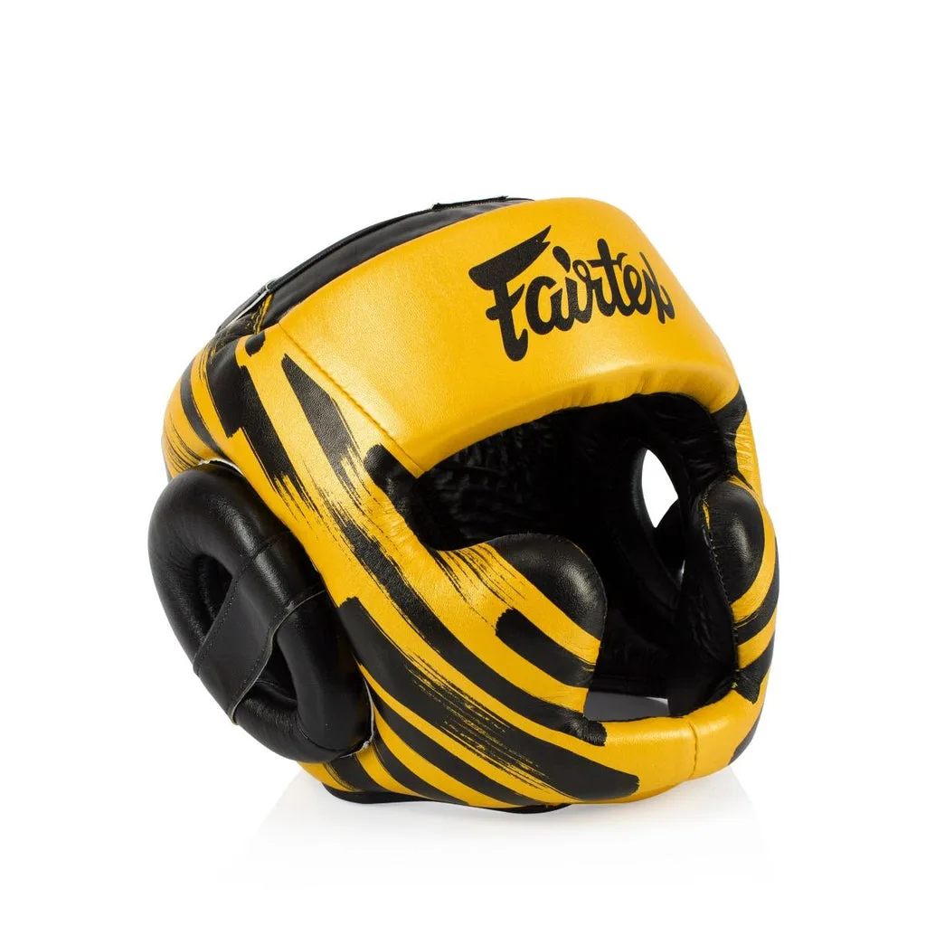 Fairtex Microfiber Headguard HG16-M2 - Gold – предна част, показваща златен цвят и форма на протектора за глава.