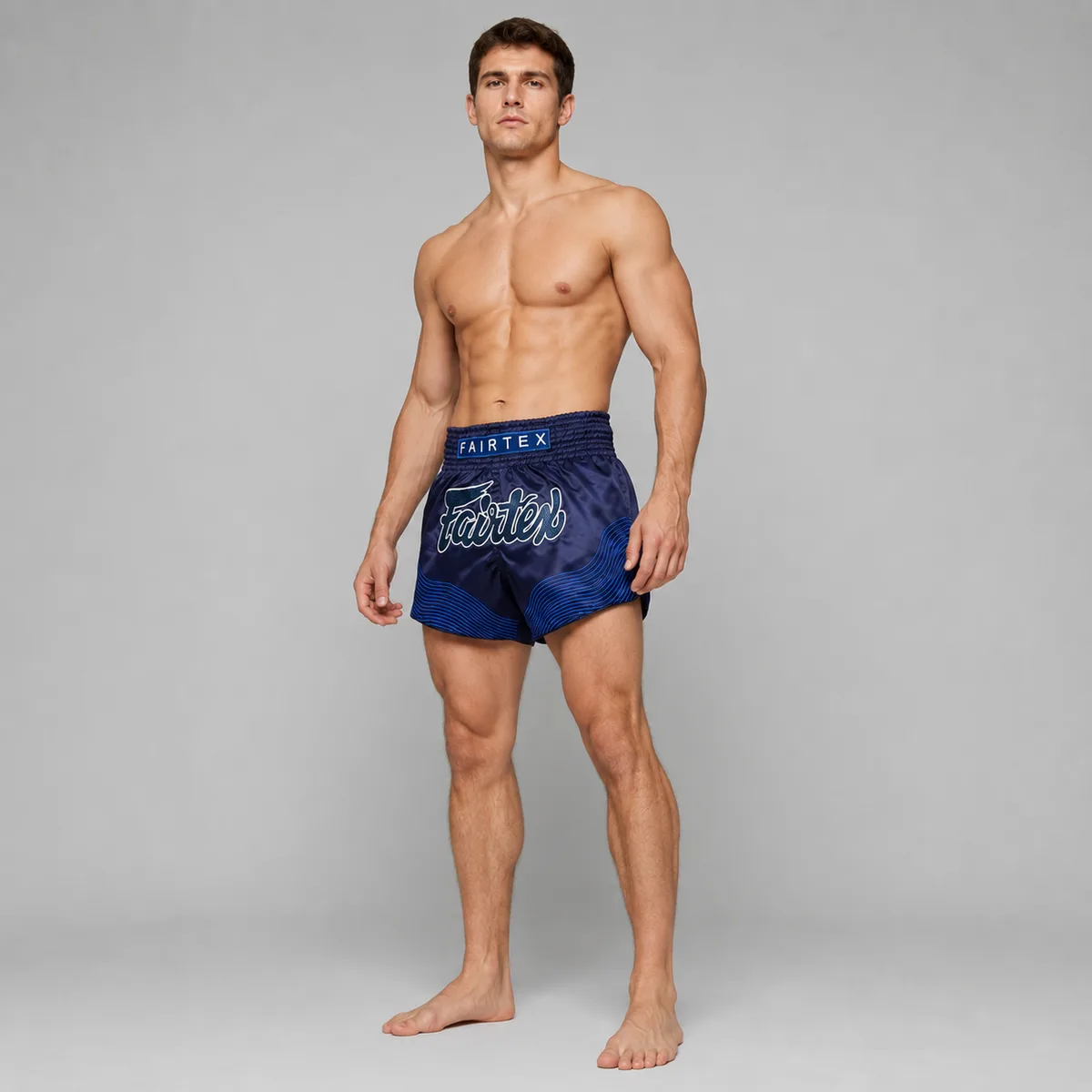 Fairtex Muay Thai Шорти Blue Ocean BS1930, син цвят, сгънати, показващи еластичния колан