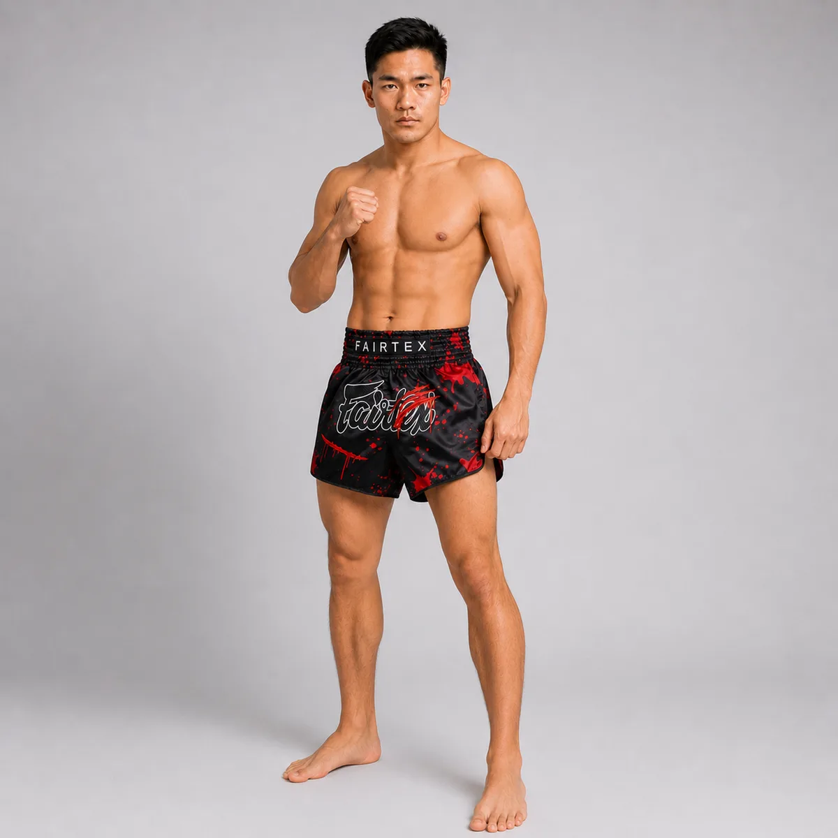 Fairtex Muay Thai Demon's Bite шорти, заден план с логото