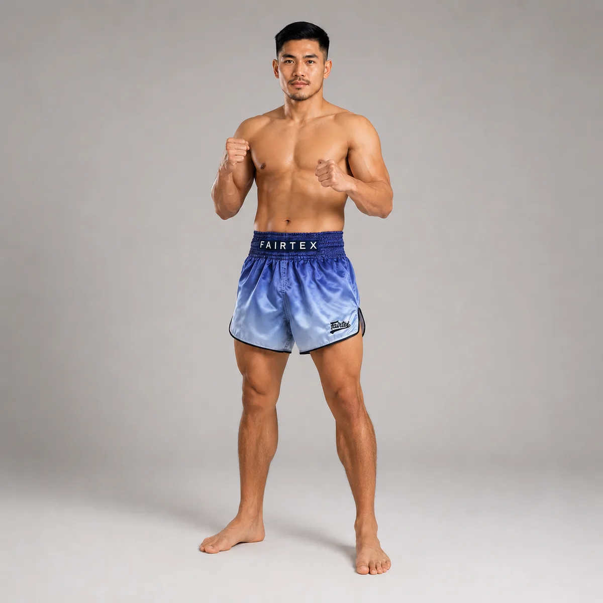 Сини Fairtex FADE BS1905 шорти, сгънати, показващи материята микро сатен