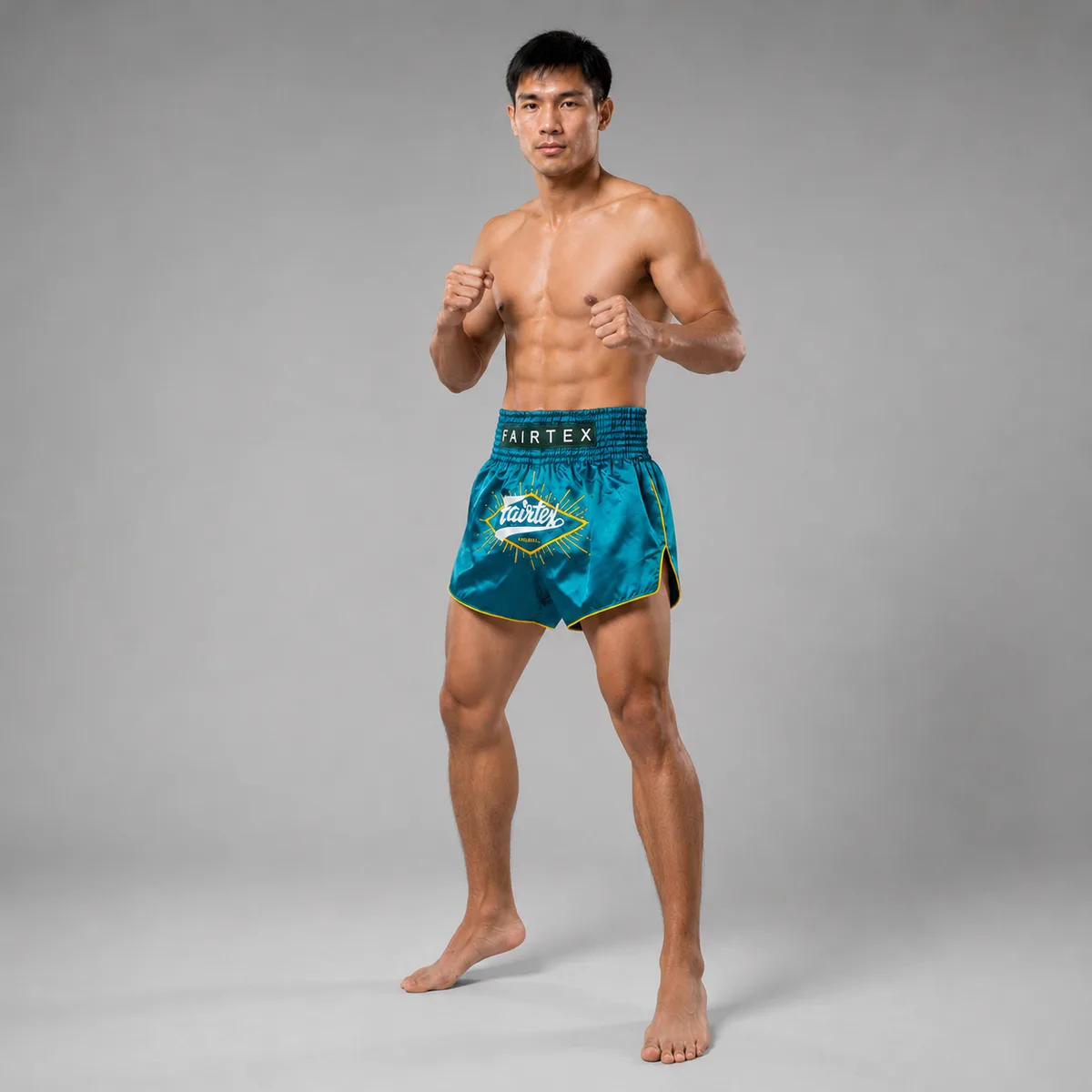 Текстура на материята и шевовете на зелените шорти Fairtex Focus BS1907