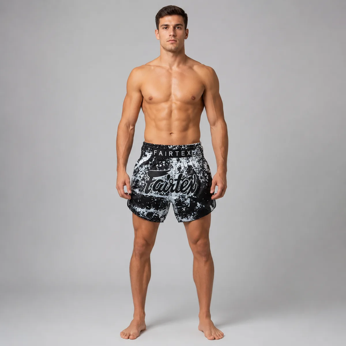 Заден изглед на шортите Fairtex Grunge Black BS1949, акцентиращ върху цялостния силует и маркировката на Fairtex.