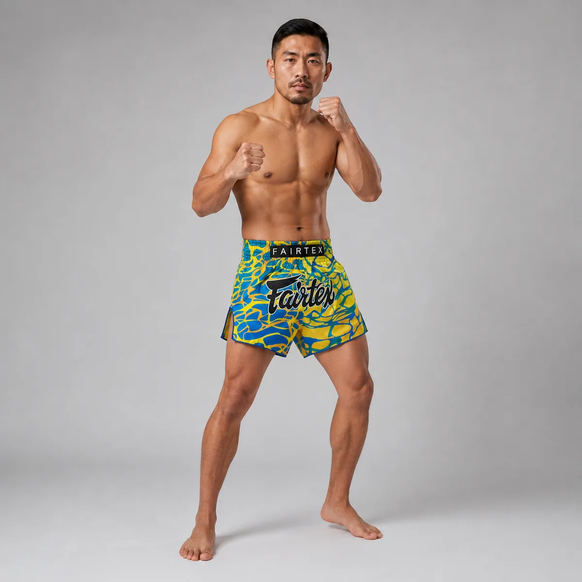 Fairtex Muay Thai Shorts Magma Green BS1927 – детайл на логото