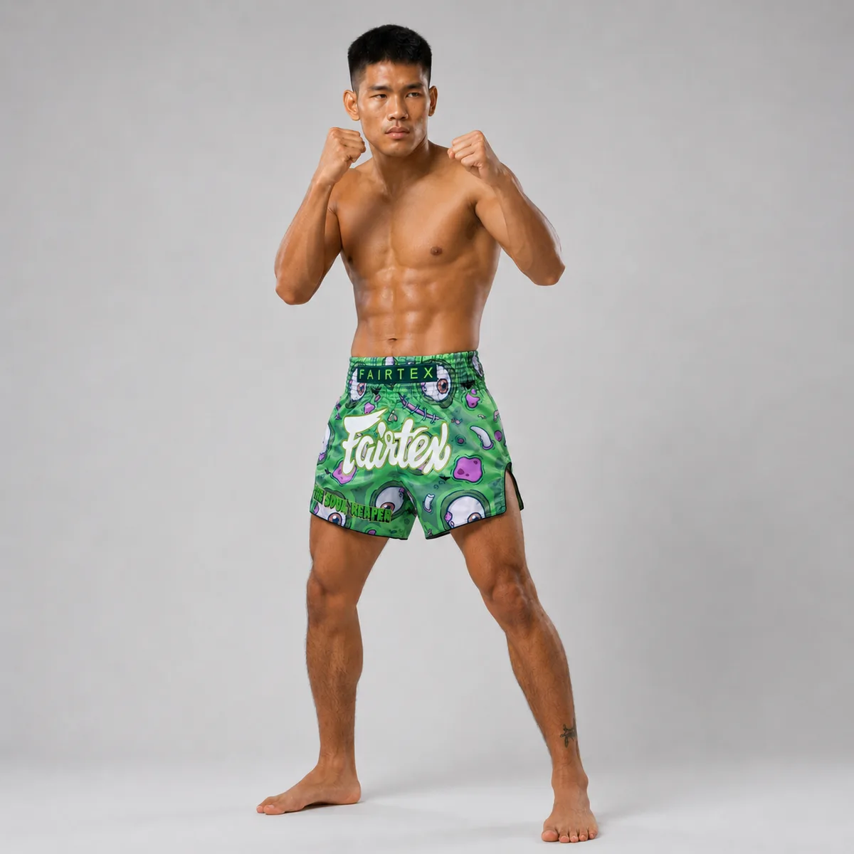 Fairtex Muay Thai шорти Soul Reaper – детайл от принта с чудовища и изпъкнали очи
