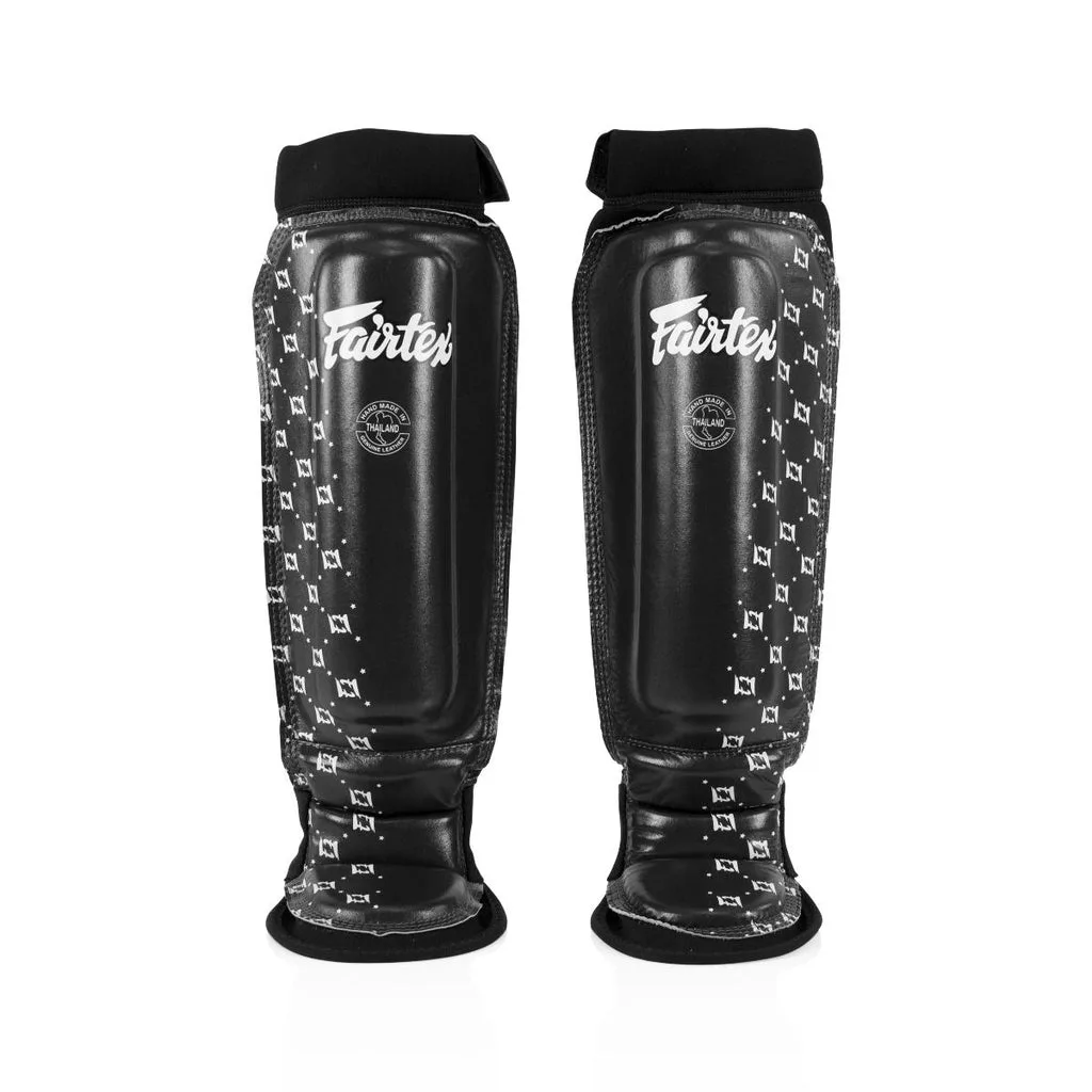 Черни неопренови протектори за крака Fairtex Neoprene Shin Guards SP6, поставени върху бял фон