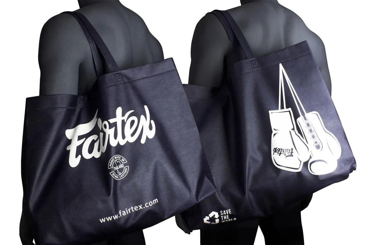 Fairtex Save Earth Tote Bag, поставена на маса с други предмети
