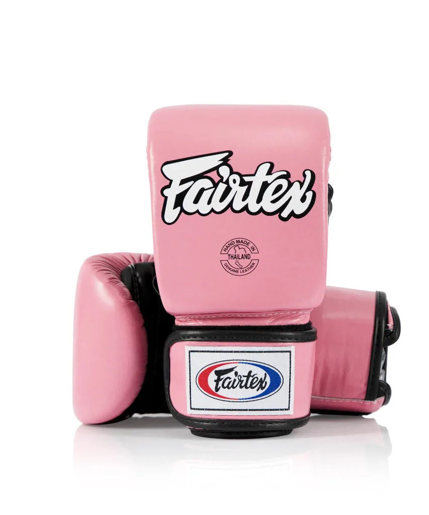 Розови ръкавици Fairtex Super Sparring Bag Gloves TGO3 с отворен палец на бял фон