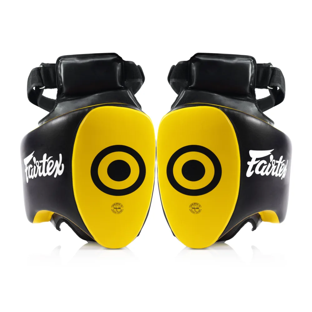 Fairtex Thigh Pad TP5 – черен и жълт протектор за бедро, използван от треньори в бойни спортове