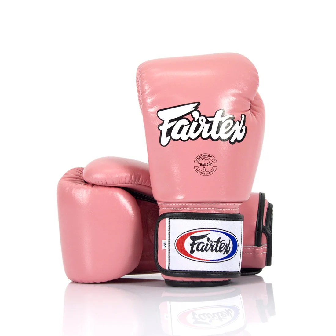 Розови боксови ръкавици Fairtex BGV1 с плътно прилягане, изработени от естествена кожа, показани отпред.