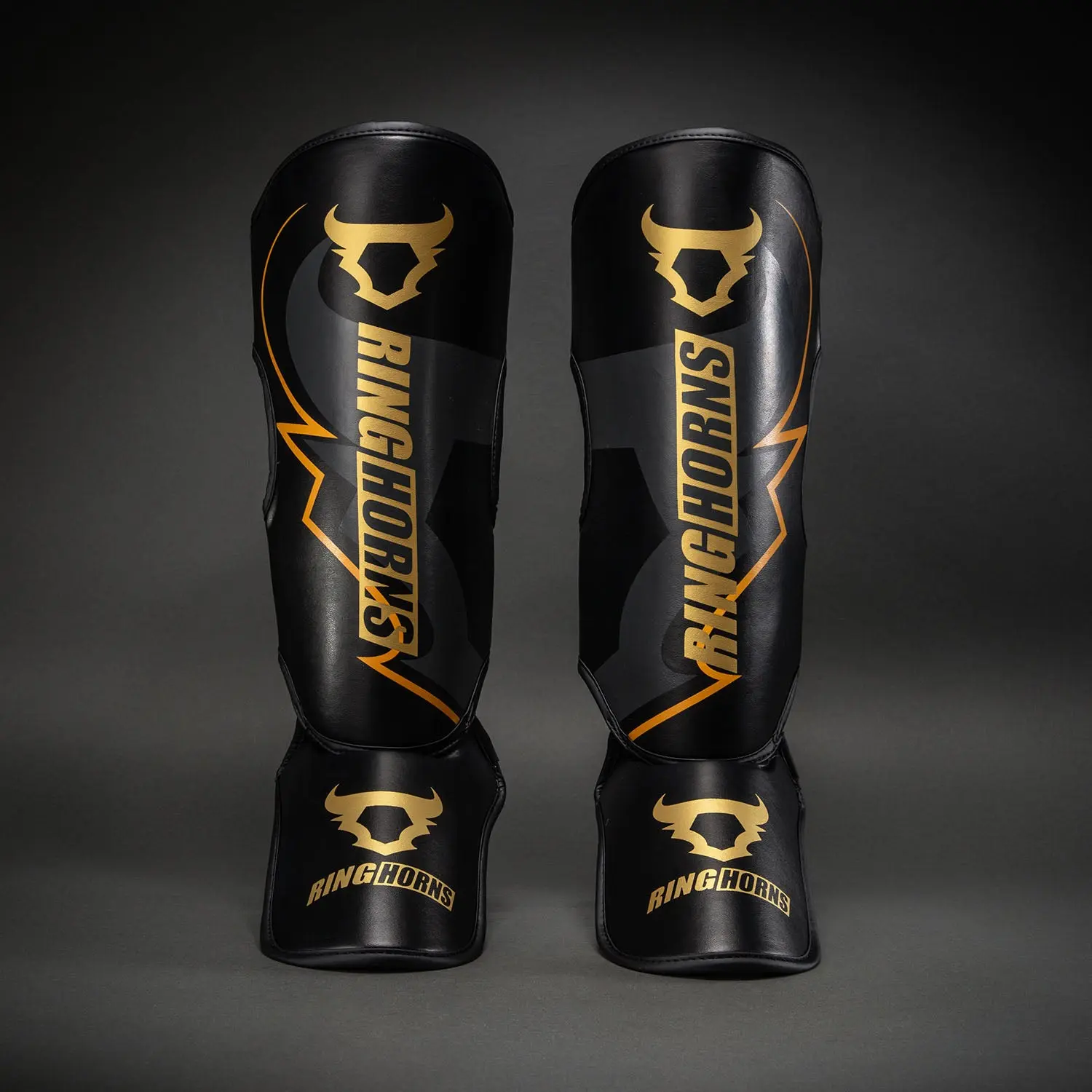 Ringhorns Charger by Venum Shin Guards - Black/Gold, преден изглед