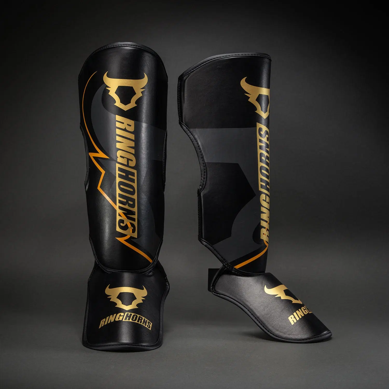 Ringhorns Charger by Venum Shin Guards - Black/Gold