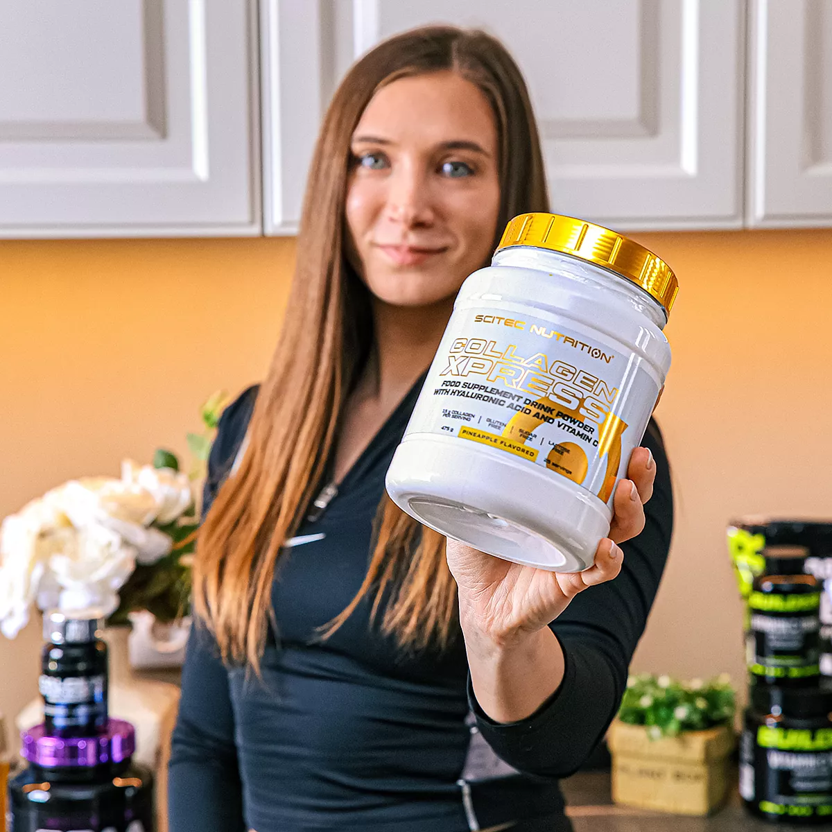 Отблизо на праха Scitec Nutrition Collagen Xpress в мерителна лъжичка