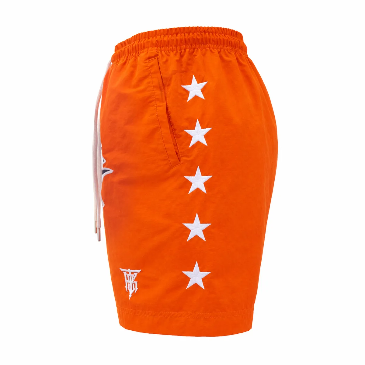Детайлна снимка на оранжевите шорти Top King Lifestyle, показваща еластичния колан и логото на марката.