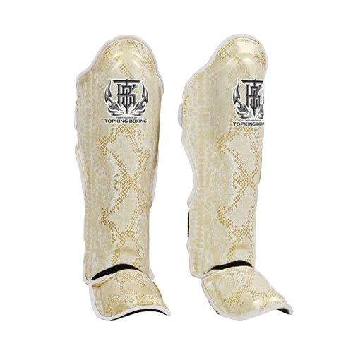 TOPKING SHIN GUARDS WHITE GOLD SUPER SNAKE – бели протектори за крака със златни елементи и мотив „супер змия“