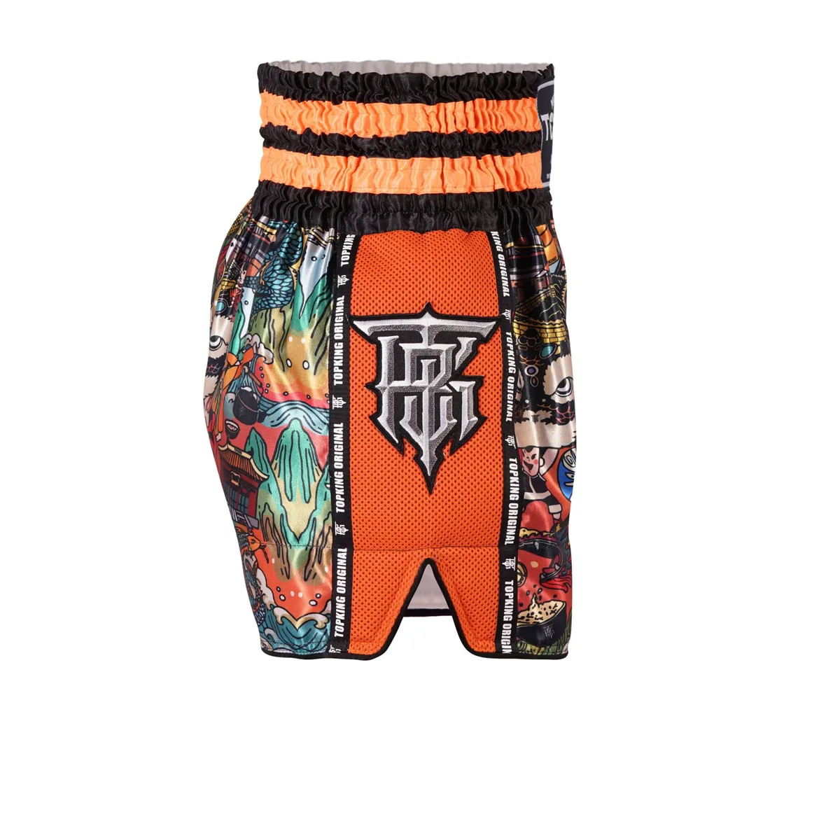 Страничен изглед на оранжеви шорти Top King Thai Boxing Shorts, подчертаващ широките странични цепки за свобода на движение.