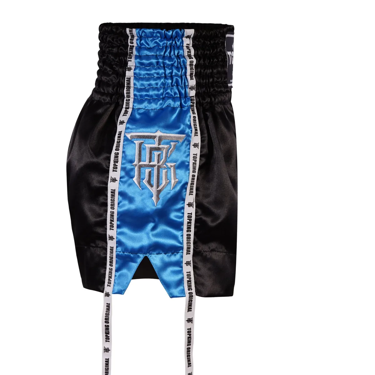 Страничен изглед на небесносините Top King шорти, демонстриращ широката кройка и свободата на движение.