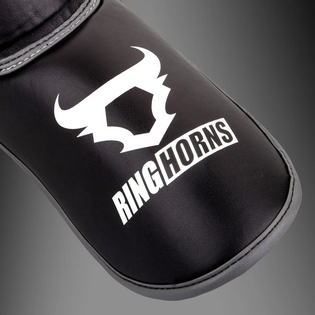 Venum Ringhorns Charger by Venum Shin Guards and Foot Protectors - Black, детайл от предната част на стъпалото