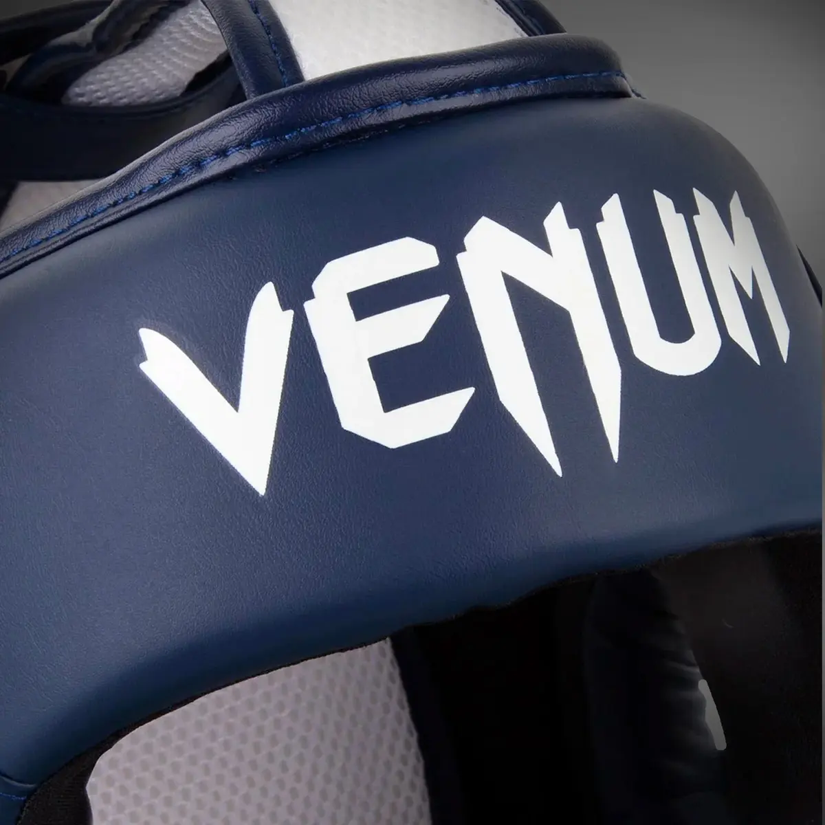 Venum Elite Headgear - White/Navy Blue близо до логото
