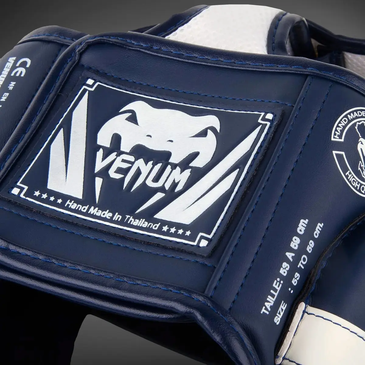 Venum Elite Headgear - White/Navy Blue етикет с размер и лого