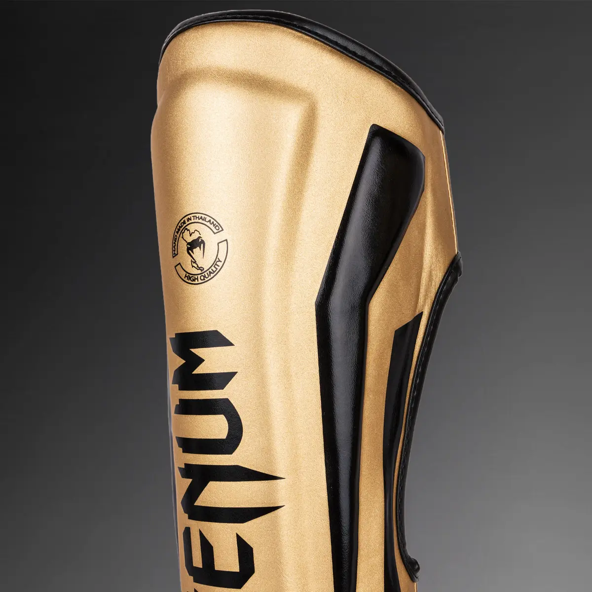 Venum Elite Standup Shin guards - Gold/Black детайл на лого
