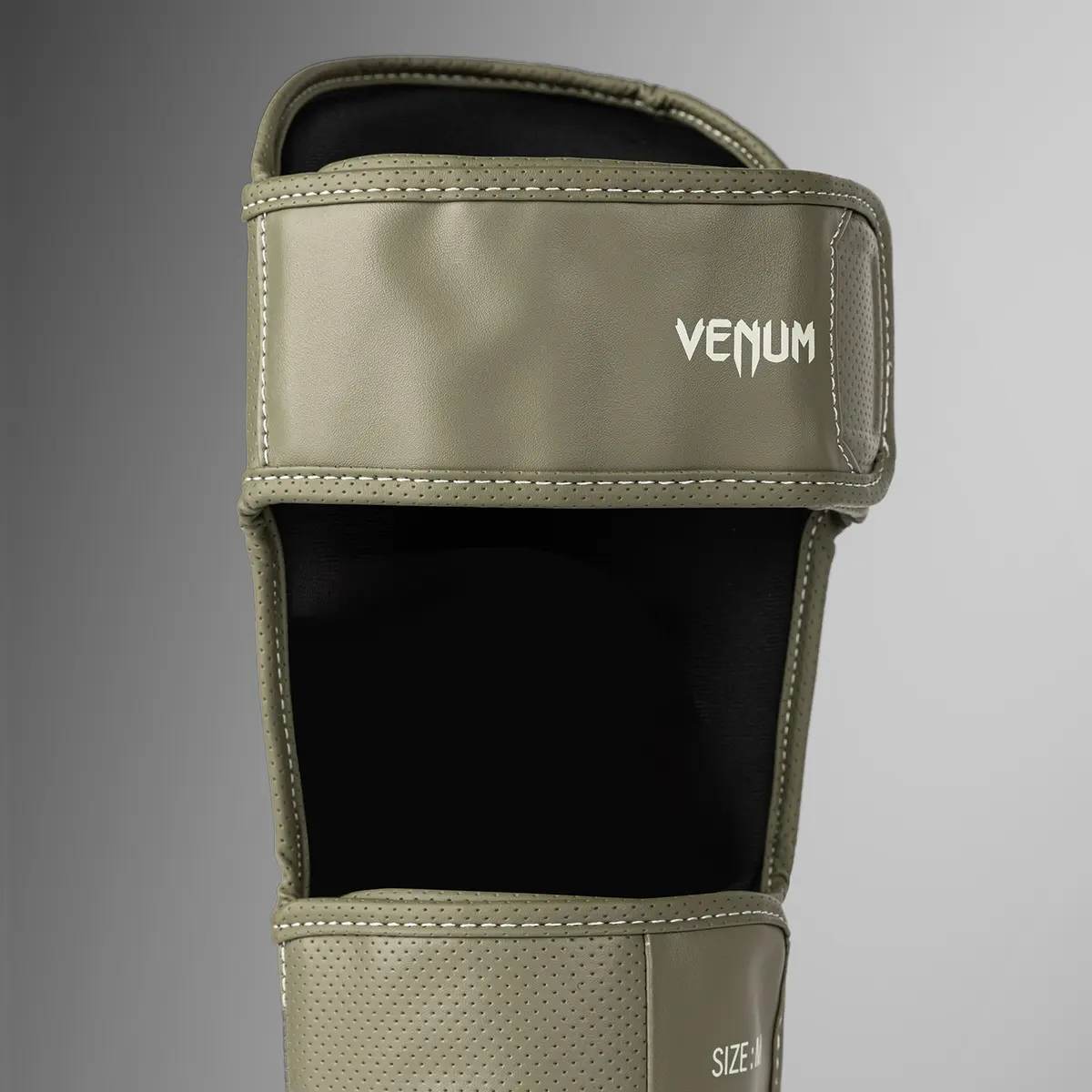 Venum Impact Evo Scales Shin Guards Army Green детайл от закопчаването