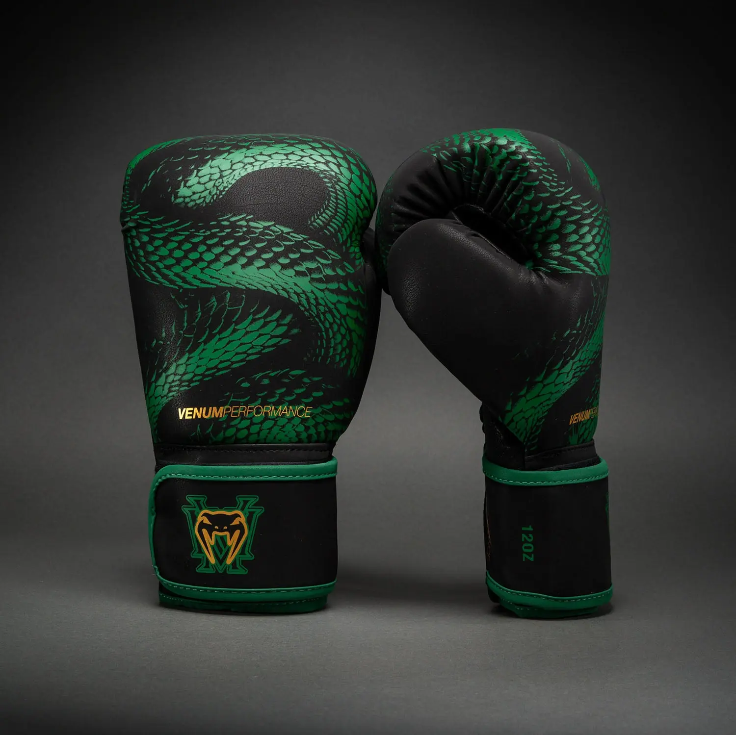 Venum Matupa Boxing Gloves - Black/Green/Gold преден изглед с лого