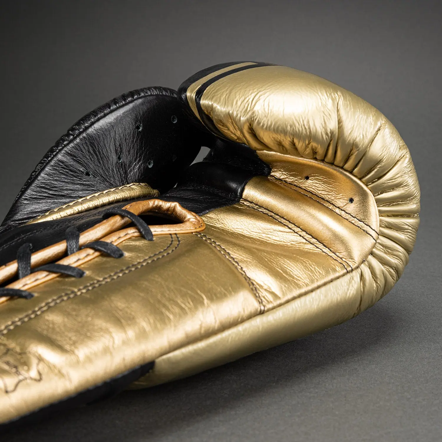 Venum Shield Pro Boxing Gloves with Laces - Black/Gold: вид отстрани, златен цвят