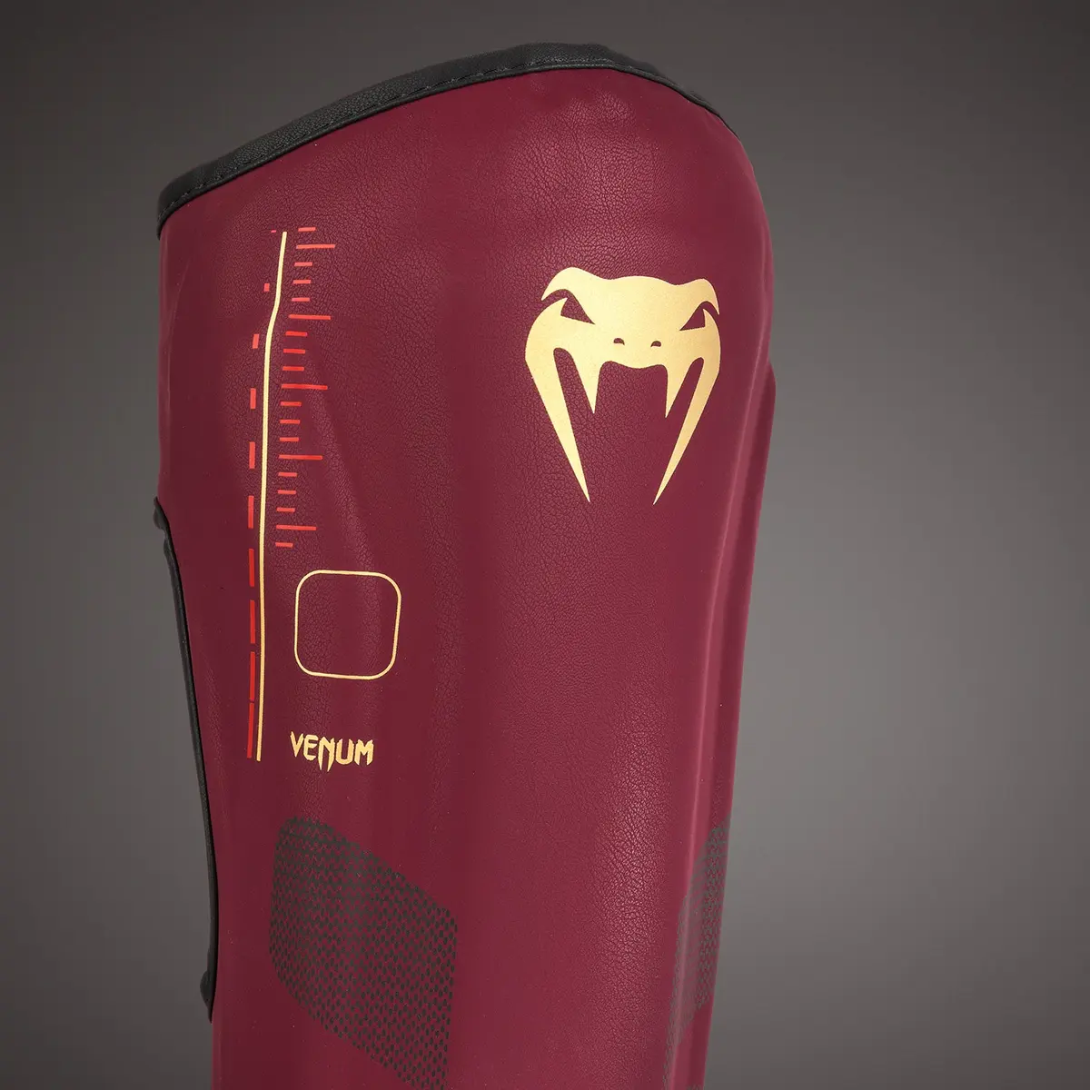 Venum Tactical XT Shinguards - Black/Burgundy/Gold, детайл на логото