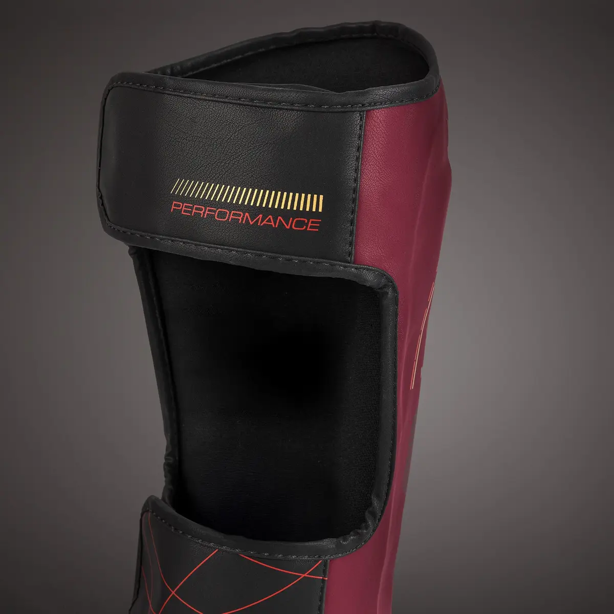 Venum Tactical XT Shinguards - Black/Burgundy/Gold, детайл на залепването