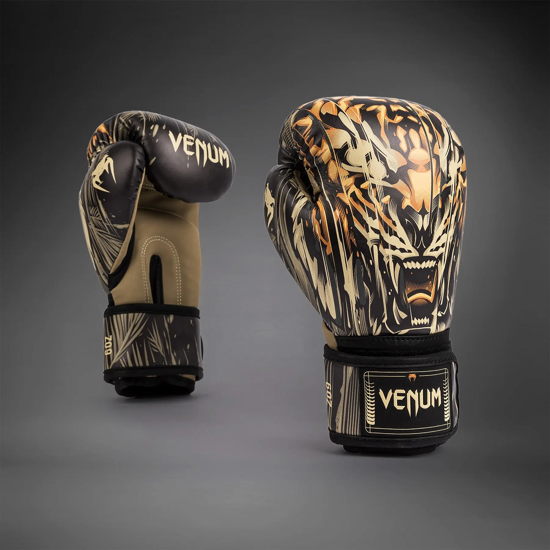 Venum Tiger Kids Boxing Gloves - Black/Neon Orange лява и дясна ръкавица