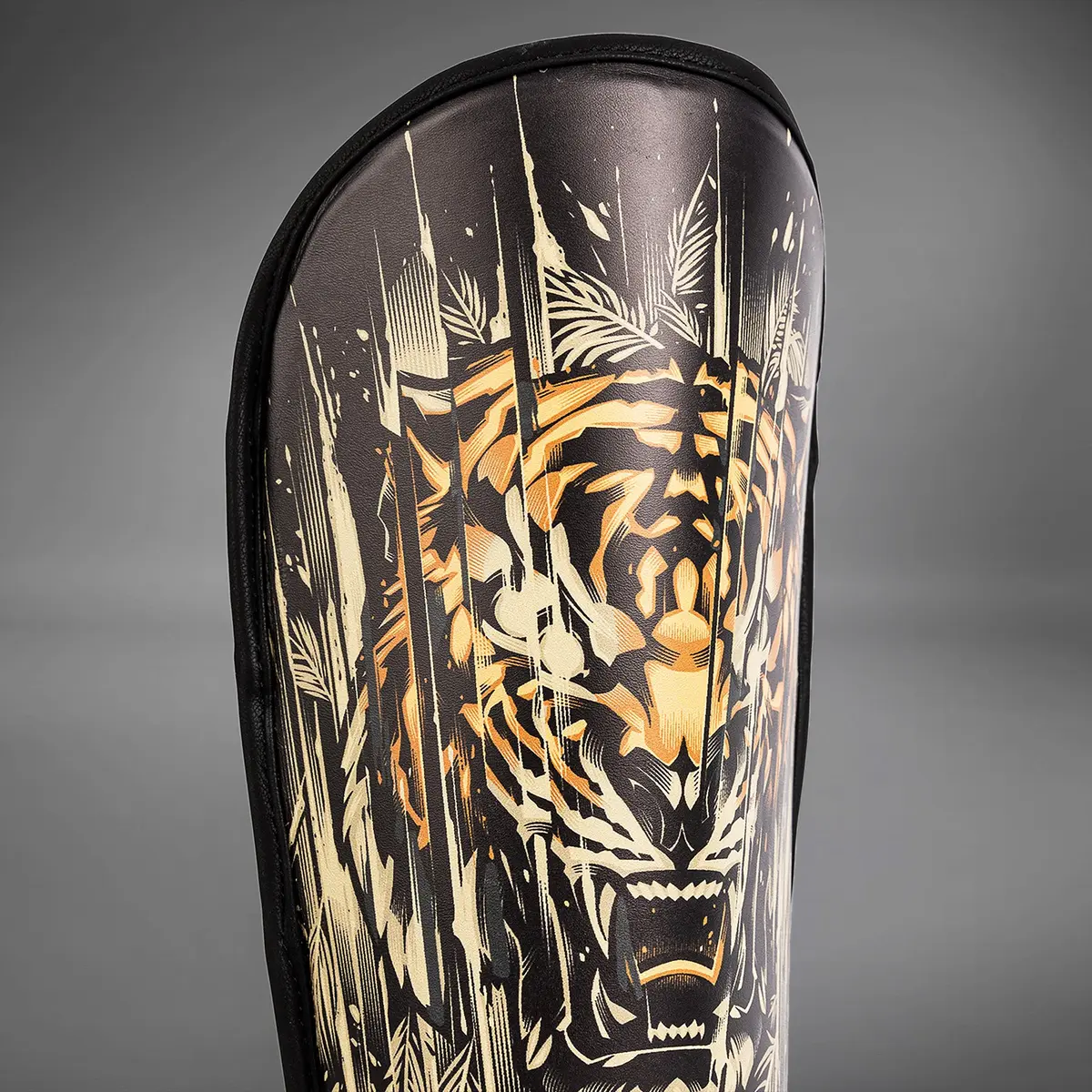 Venum Tiger Kids Shin Guards - Black/Neon Orang детайл тигър