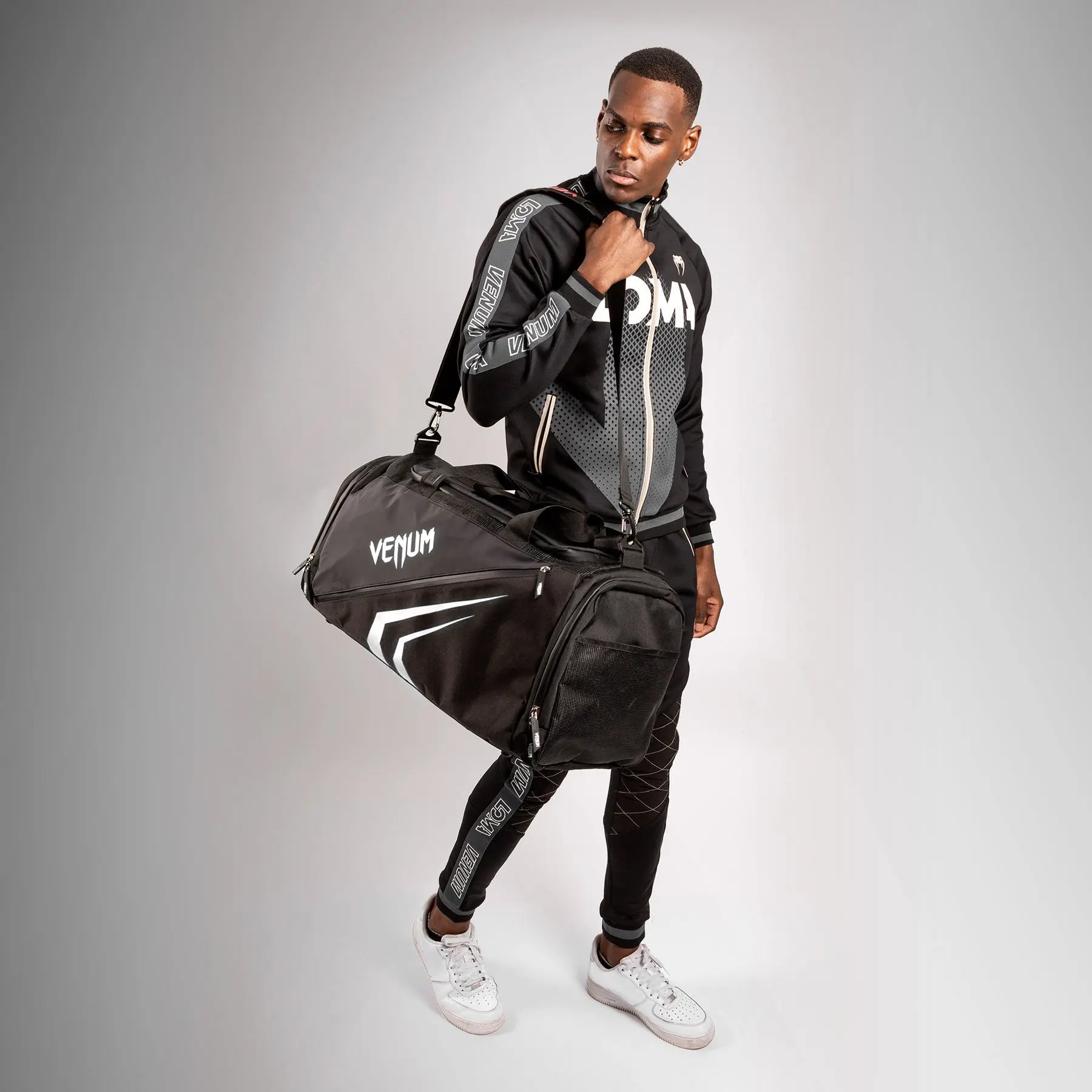 Venum Trainer Lite Evo Sports Bags (48L) - Black/White, спортна чанта, носена от мъж